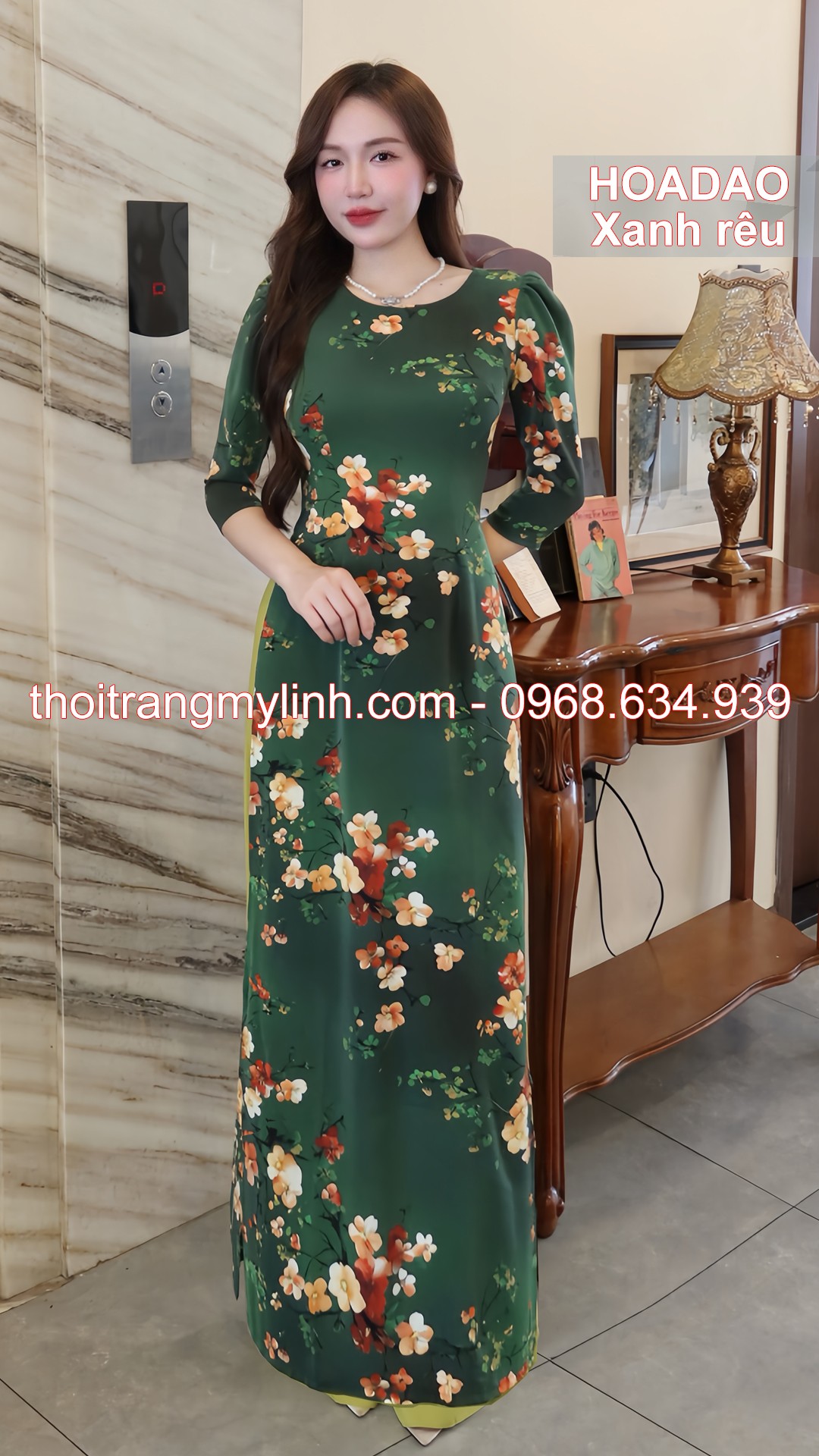 Áo dài cổ tròn họa tiết hoa đào màu xanh rêu