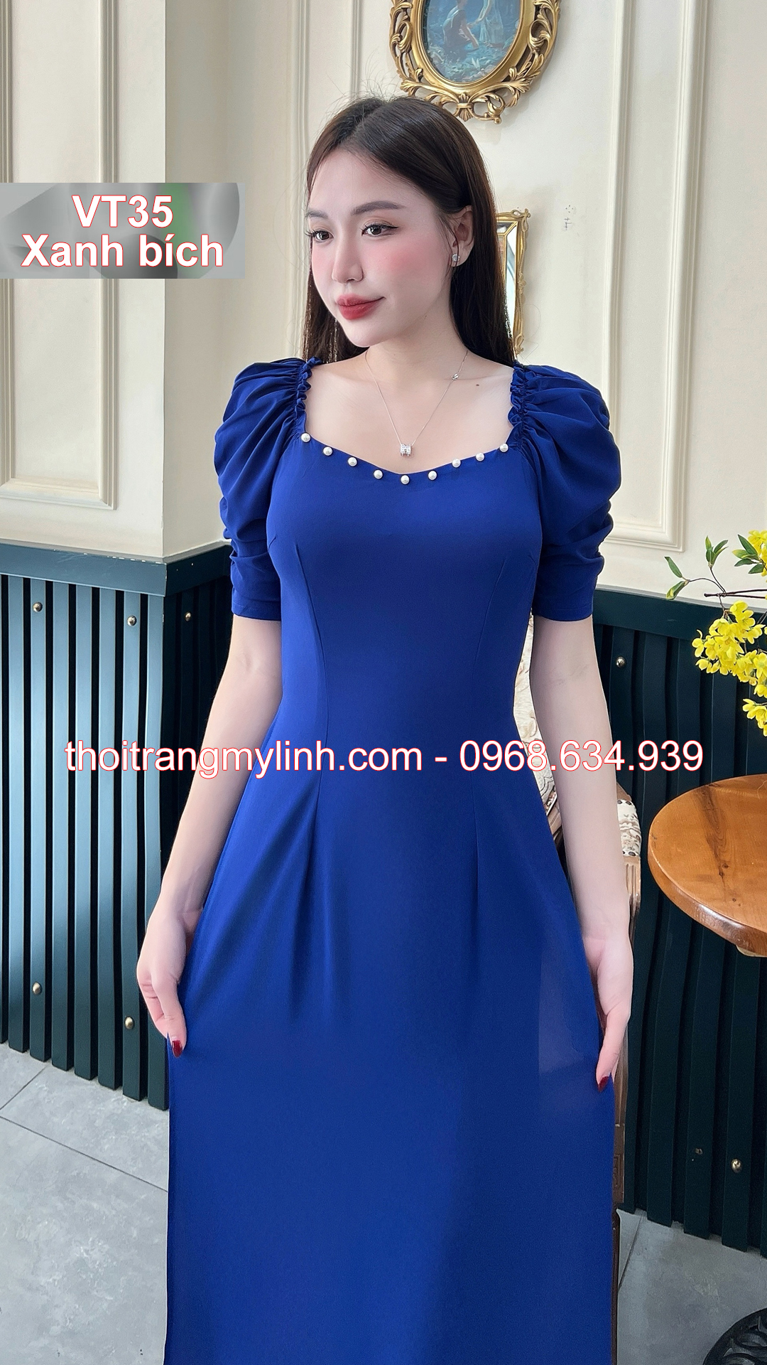 Bộ áo dài cổ tim bầu tay dún màu xanh bích	